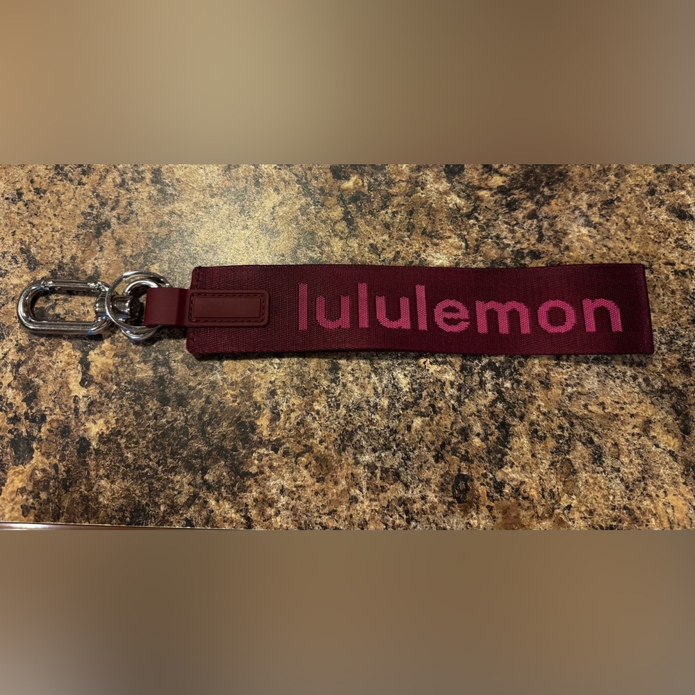 Lululemon Burgundy and Pink never lost keychain
